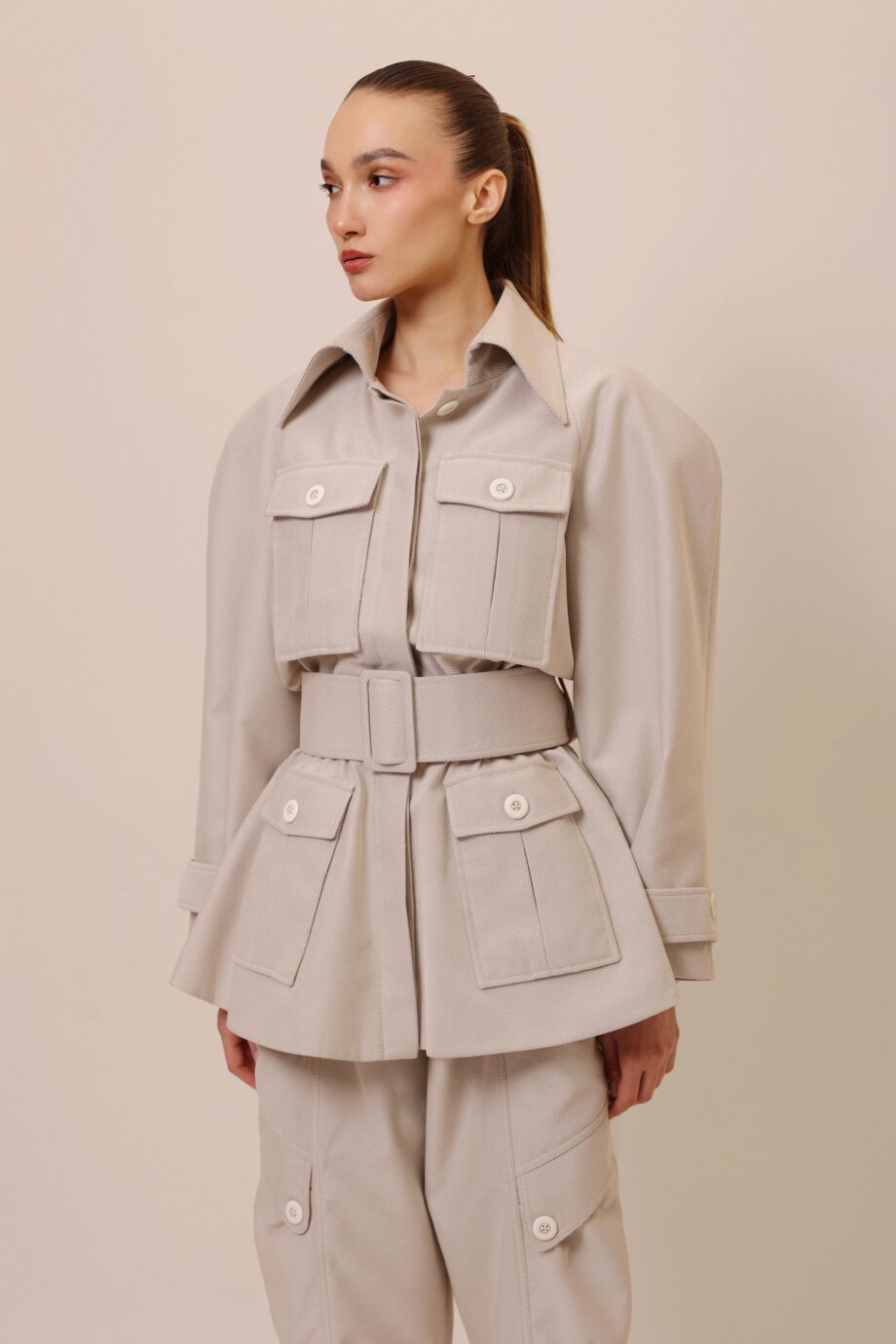 utility pockets belted jacket detail